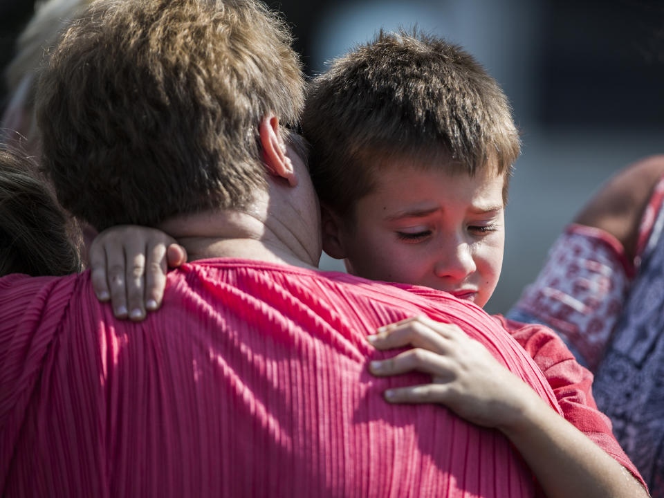 <p>A woman hugs a boy following a shooting at Townville Elementary in Townville Wednesday, Sept. 28, 2016. (Katie McLean/The Independent-Mail via AP) </p>