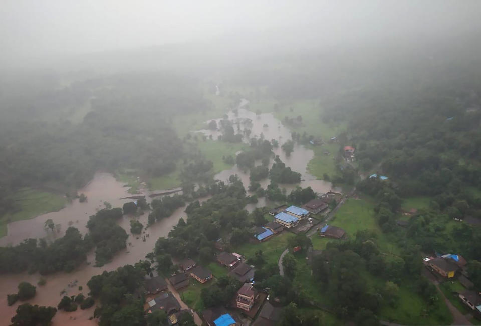 This photograph provided by Indian Air Force shows flooding in Ratnagiri district, in the western Indian state of Maharashtra, Thursday, July 22, 2021. Landslides triggered by heavy monsoon rains hit parts of western India, killing at least five people and leading to the overnight rescue of more than 1,000 other people trapped by floodwaters, an official said Friday. (Indian Air Force via AP)