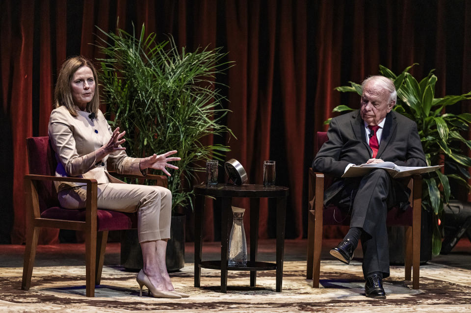 U.S. Supreme Court Justice Amy Coney Barrett speaks with Professor Robert A. Stein at Northrop Auditorium as part of the Stein Lecture Series in Minneapolis, Monday, Oct. 16, 2023. (Richard Tsong-Taatarii/Star Tribune via AP)