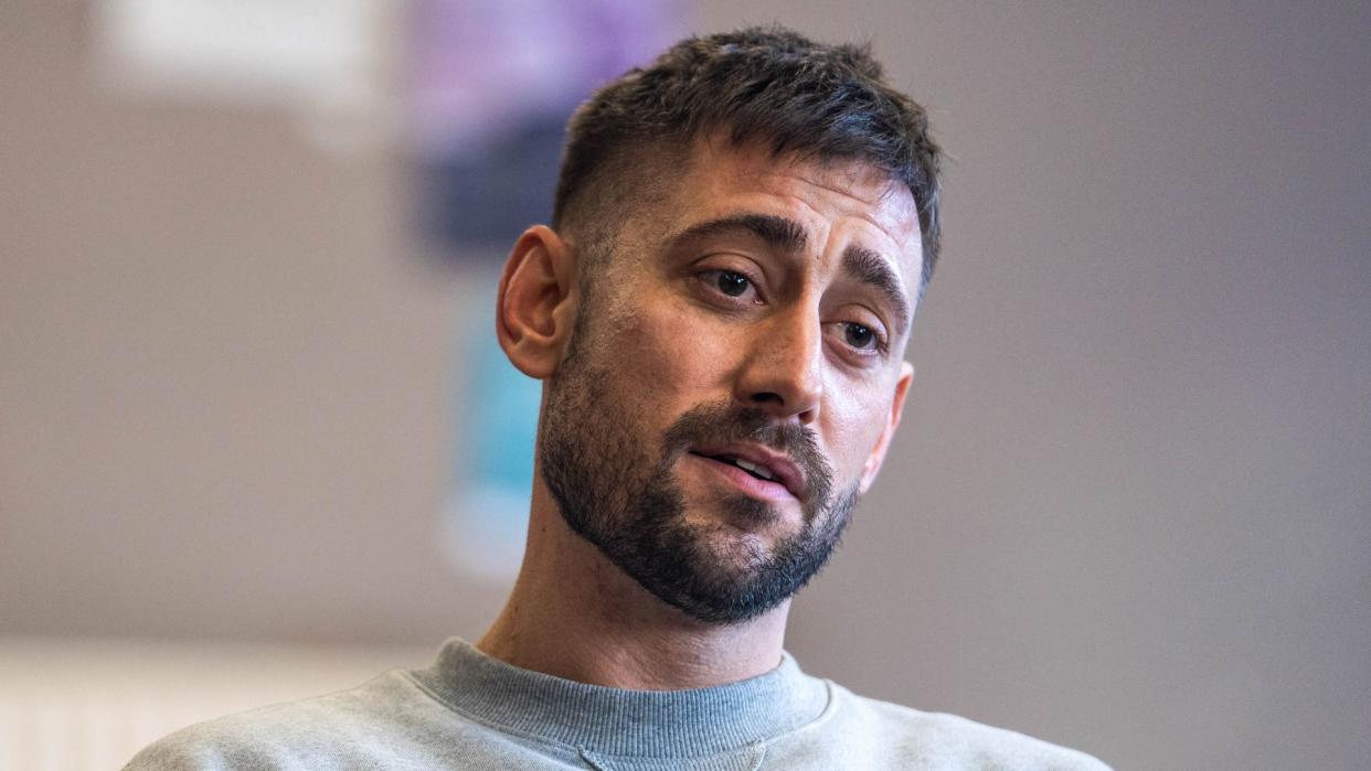 Michael Socha as Justin in Showtrial