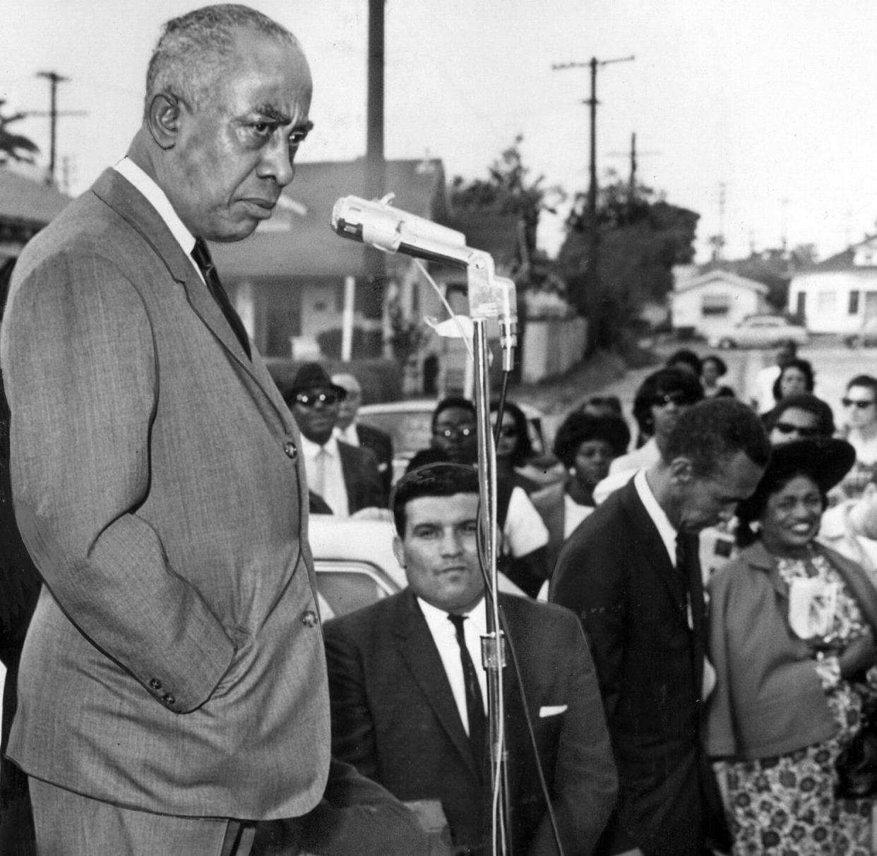 Councilman Gilbert Lindsay appears before a crowd.