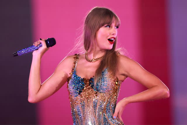 <p>Michael Tran / AFP) (Photo by MICHAEL TRAN/AFP via Getty</p> Taylor Swift performing during her Eras Tour