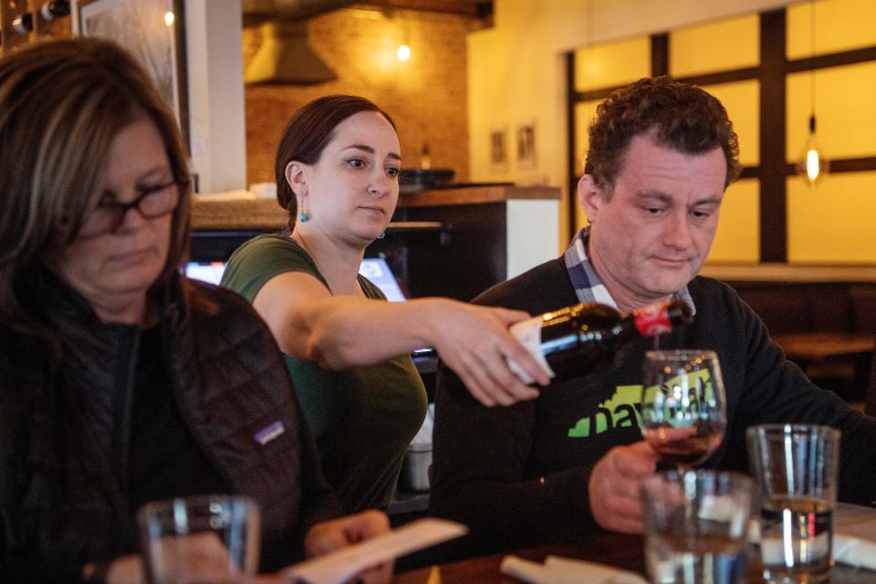 Rachel Gordon pours wine into a glass for a customer to try before serving it to the table at Avenue M, February 7, 2024.