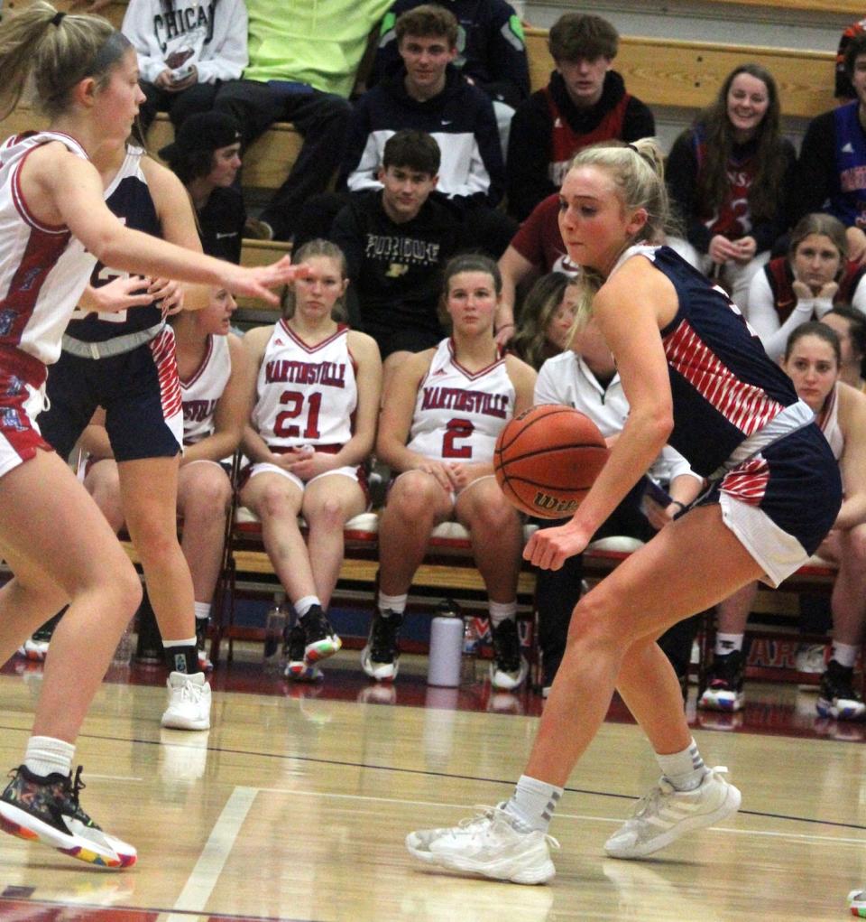 Bedford North Lawrence sophomore Chloe Spreen drives to the basket during Thursday's game at Martinsville. 