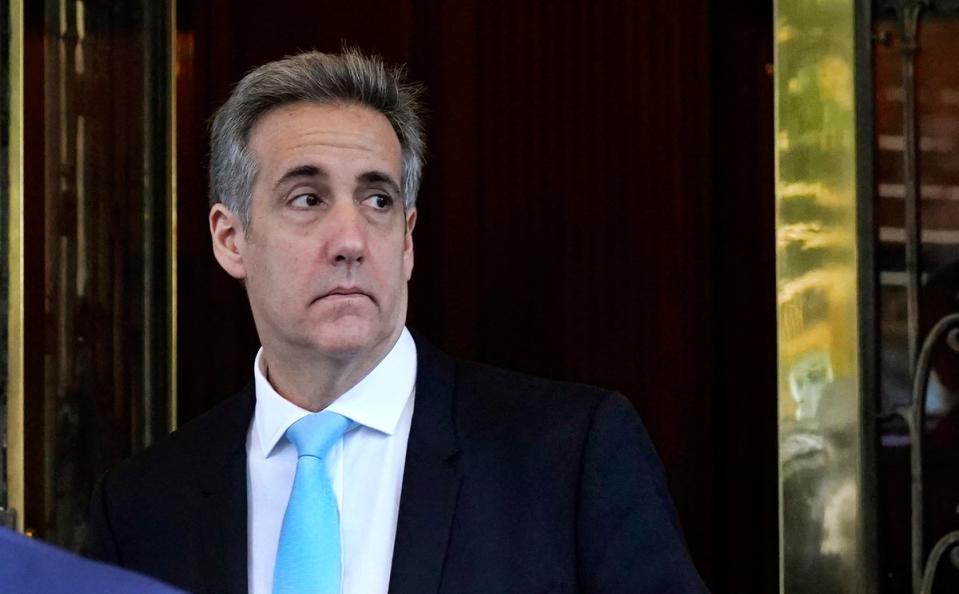Michael Cohen leaves his home to head to Manhattan Criminal Court for a second day of testimony in Donald Trump’s criminal trial on May 14 2024 (AFP via Getty Images)