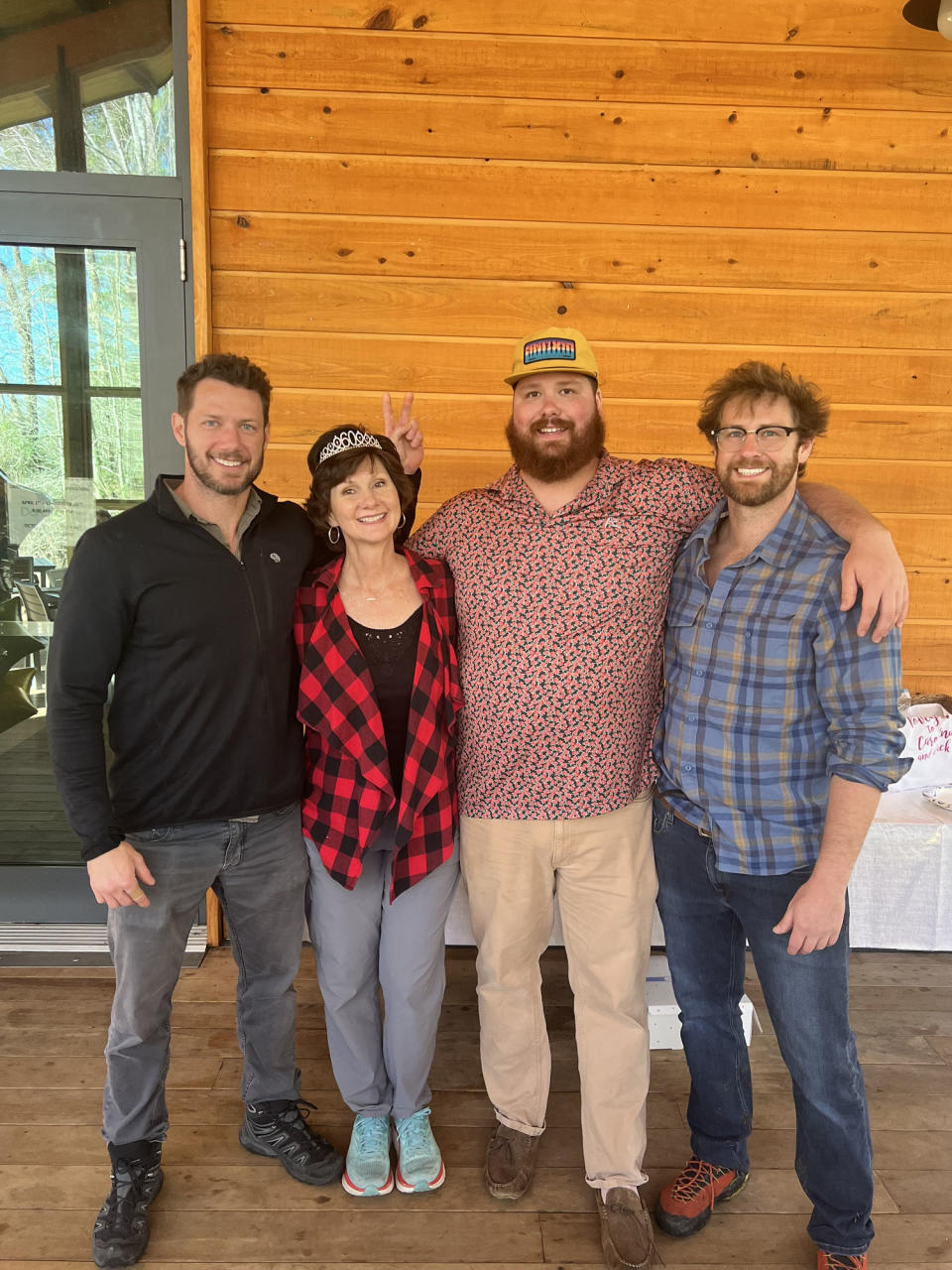 Johnny Wactor, left, with his mother, Scarlett, and brothers Grant and Lance. (Scarlett Wactor / Courtesy)