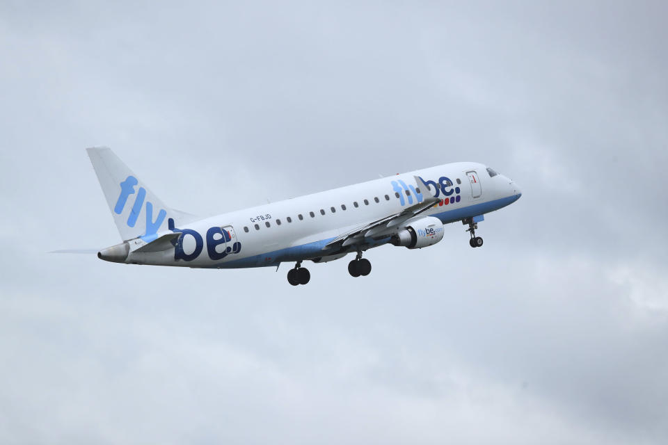 FILE - A view of a Flybe flight departing from Manchester Airport, Manchester, England, Jan. 13, 2020. Struggling U.K. airline Flybe has collapsed for the second time in less than three year it was announced on Saturday, Jan. 28, 2023. The flyer initially limped into bankruptcy in March 2020, with the loss of 2,400 jobs. It was relaunched in April 2022 with hedge fund backing, but has called in the bankruptcy accountants once again after less than 12 months back in the air. (Peter Byrne/PA via AP, File)