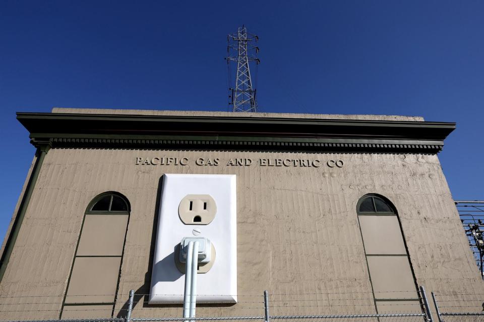 PHOTO: In this Jan. 26, 2022, file photo, a truck tower carrying electrical lines stands behind a Pacific Gas & Electric (PG&E) electrical substation in Petaluma, Calif. (Justin Sullivan/Getty Images, FILE)