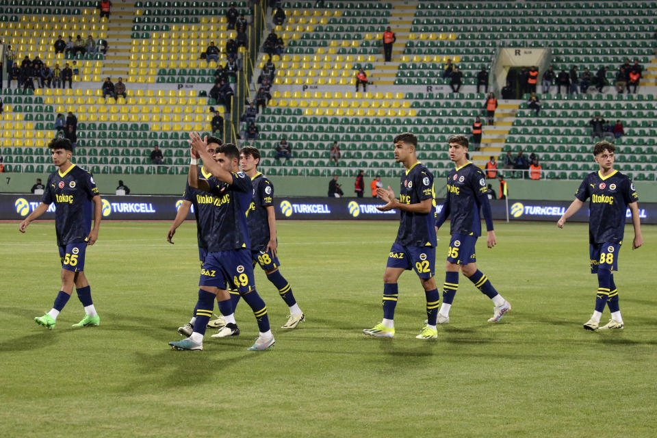 Fenerbahce's players withdrew from the pitch after Galatasaray's first goal during Turkey Super Cup Final soccer match in Sanliurfa, Turkey, Sunday, April 7, 2024. (Murat Akbas/Dia Images via AP)