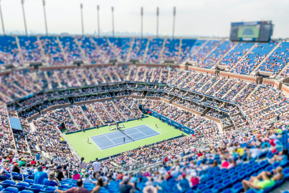 Tiny people fill out a stadium to watch the US Open in Queens, New York.