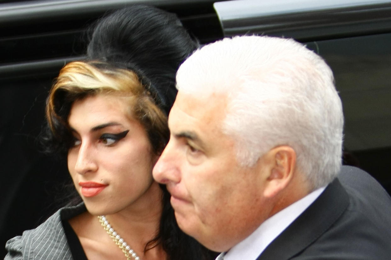 Amy Winehouse and Mitch Winehouse Amy Winehouse arriving at City of Westminster Magistrates Court to face charges of assault
