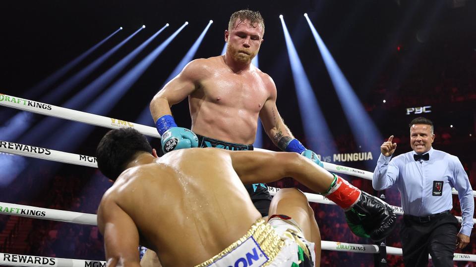 Saul 'Canelo' Alvarez looks on as Jaime Munguia falls to the canvas in Las Vegas 