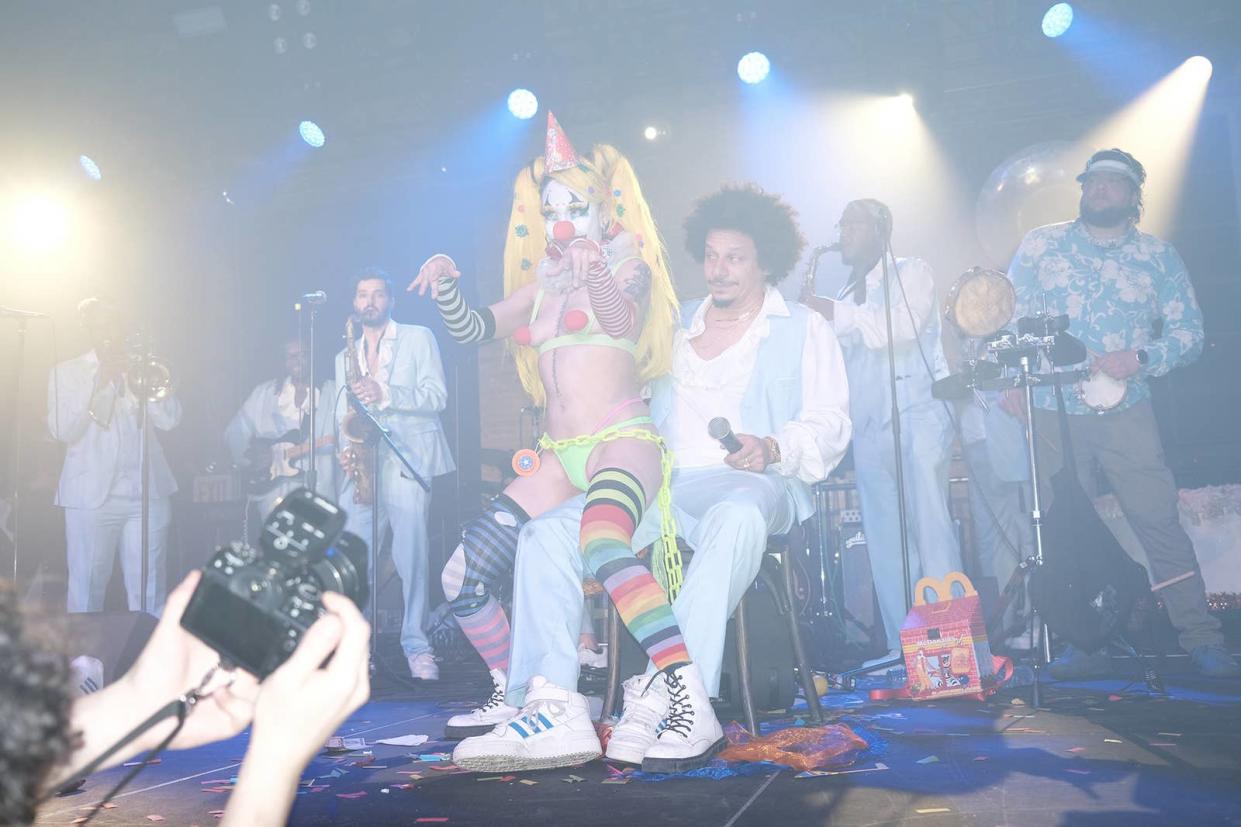Eric André receives a lap dance from a clown stripper at the Knockdown Center in Queens on April 8, 2023. 