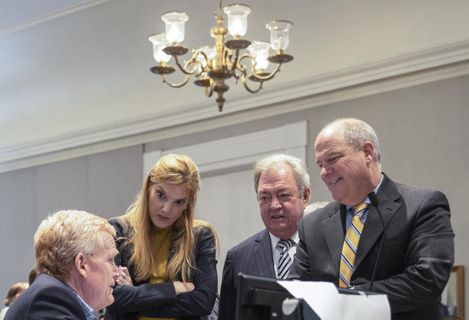 From left, Alex Murdaugh, Maggie Fox, Dick Harpootlian and Jim Griffin talk while on a break during Murdaugh’s double murder trial at the Colleton County Courthouse, Friday, Feb. 10, 2023, in Walterboro, S.C. Murdaugh is standing trial on two counts of murder in the shootings of his wife and son at their Colleton County home and hunting lodge on June 7, 2021. (Andrew J. Whitaker/The Post And Courier via AP, Pool)