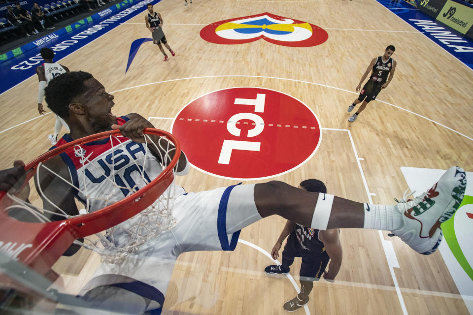 Team USA guard Anthony Edwards (10) celebrates after dunking the ball during the Basketball World Cup Group C game between the United States and Jordan, Wednesday, Aug. 30, 2023, in Manila, Philippines. (AP Photo/Ezra Acayan, Pool)