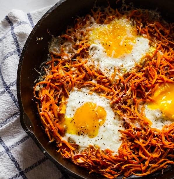 Baked Eggs Over Sweet Potatoes cooking