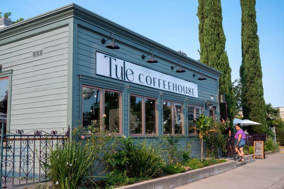 Customers read chalk board menu in front of Tule Coffeehouse in Elk Grove before entering on Saturday, July 20, 2024.