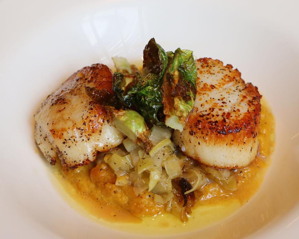 Seared scallops are part of Spuntino's Feast of the Seven Fishes this year.