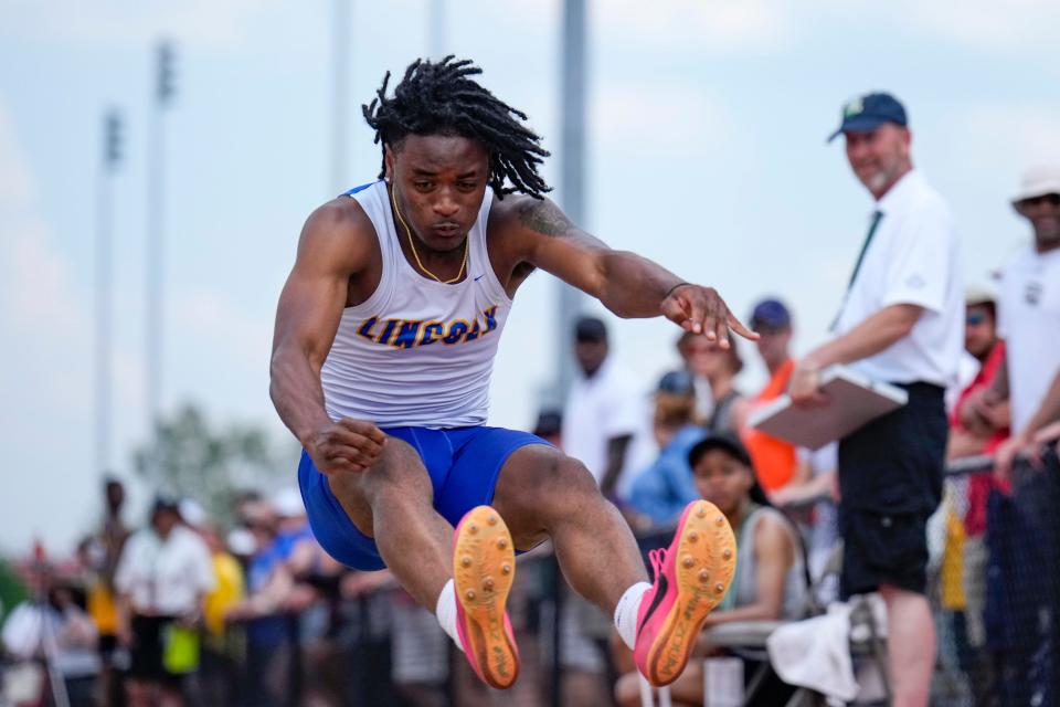 Gahanna Lincoln’s Romearo Wells competes in the long jump. He helped the Lions win a state title in the 400 relay.