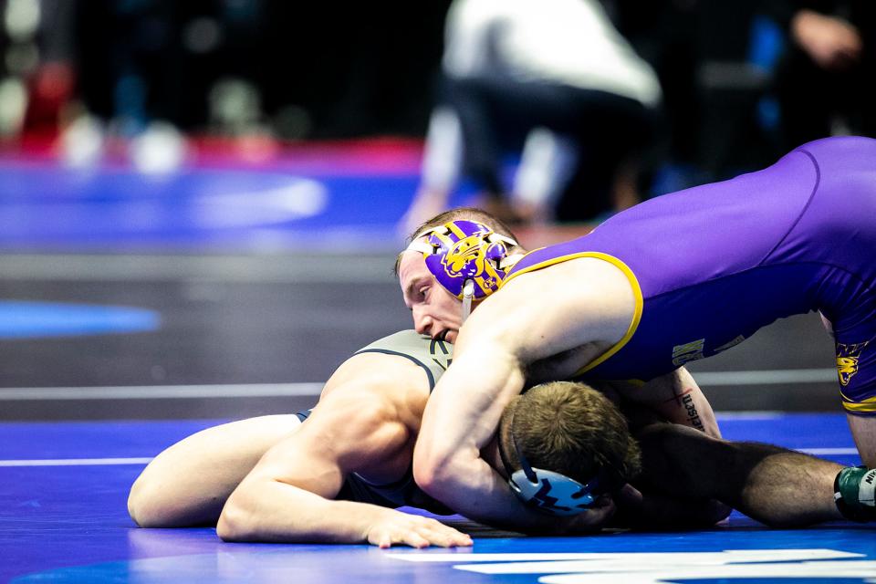 Northern Iowa's Parker Keckeisen, top, wrestles West Virginia's Anthony Carman at 184 pounds during the first session of the NCAA Division I Wrestling Championships, Thursday, March 16, 2023, at BOK Center in Tulsa, Okla.