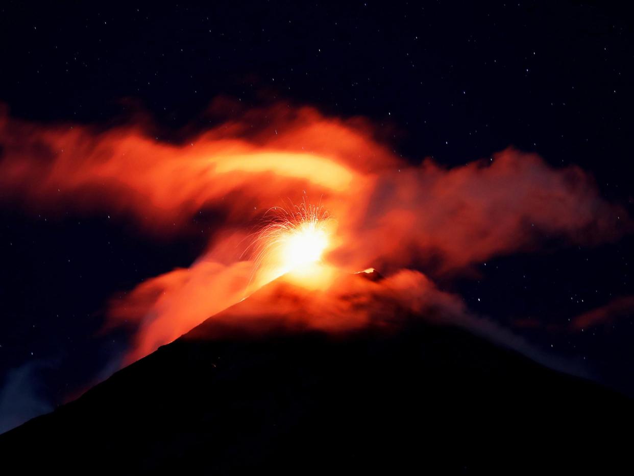 Volcano of Fire mount spews hot ashes and lava, as seen from Alotenango, Guatemala, on 18 November 2018: EPA/ESTEBAN BIBA