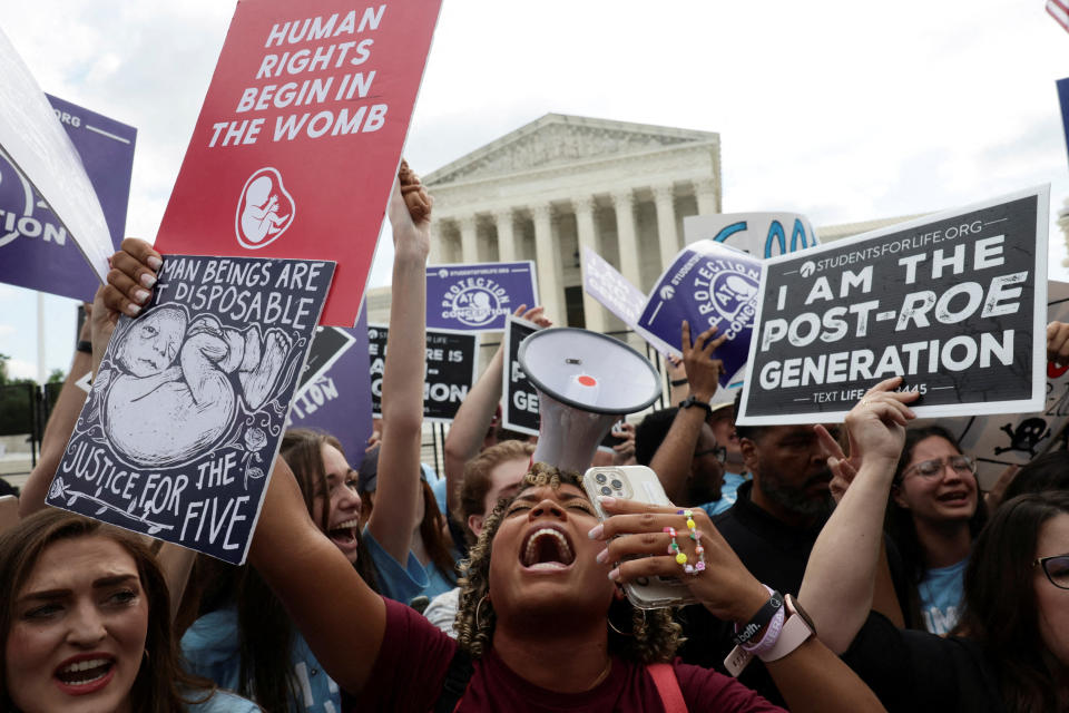 Anti-abortion demonstrators celebrate outside the United States Supreme Court as the court rules in the Dobbs v Women's Health Organization abortion case, overturning the landmark Roe v Wade abortion decision in Washington, U.S., June 24, 2022. (Evelyn Hockstein /Reuters)