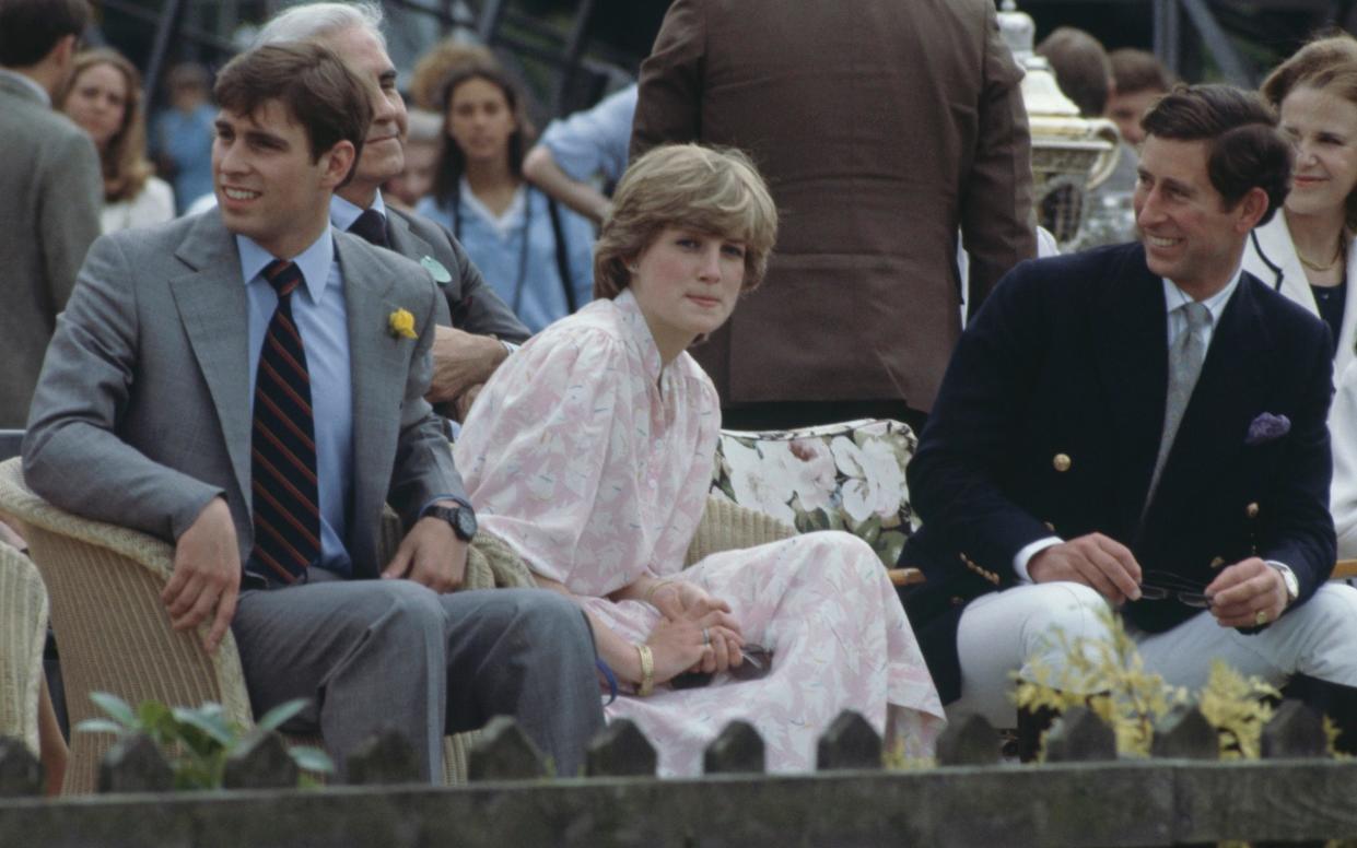 Prince Andrew, Diana, Princess of Wales, and Prince Charles watch a polo match in July 1981