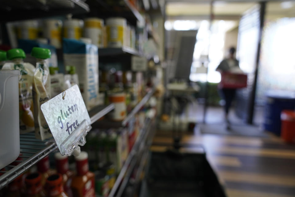 A gluten free section at Porchlight Community Service food pantry is seen Thursday, May 6, 2021, in San Diego. For millions of Americans with food allergies or intolerances, the pandemic has created a particular crisis: Most food banks and government programs offer limited options. (AP Photo/Gregory Bull)