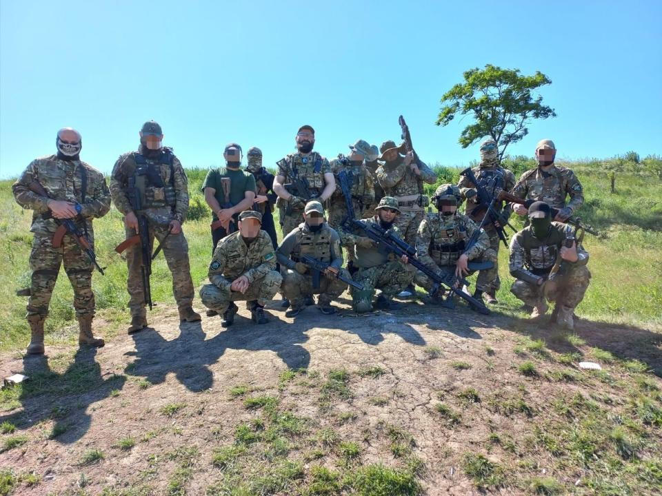 A group of volunteer fighters from the Sheikh Mansur Battalion pose in Donetsk Oblast in June 2023. (Courtesy)