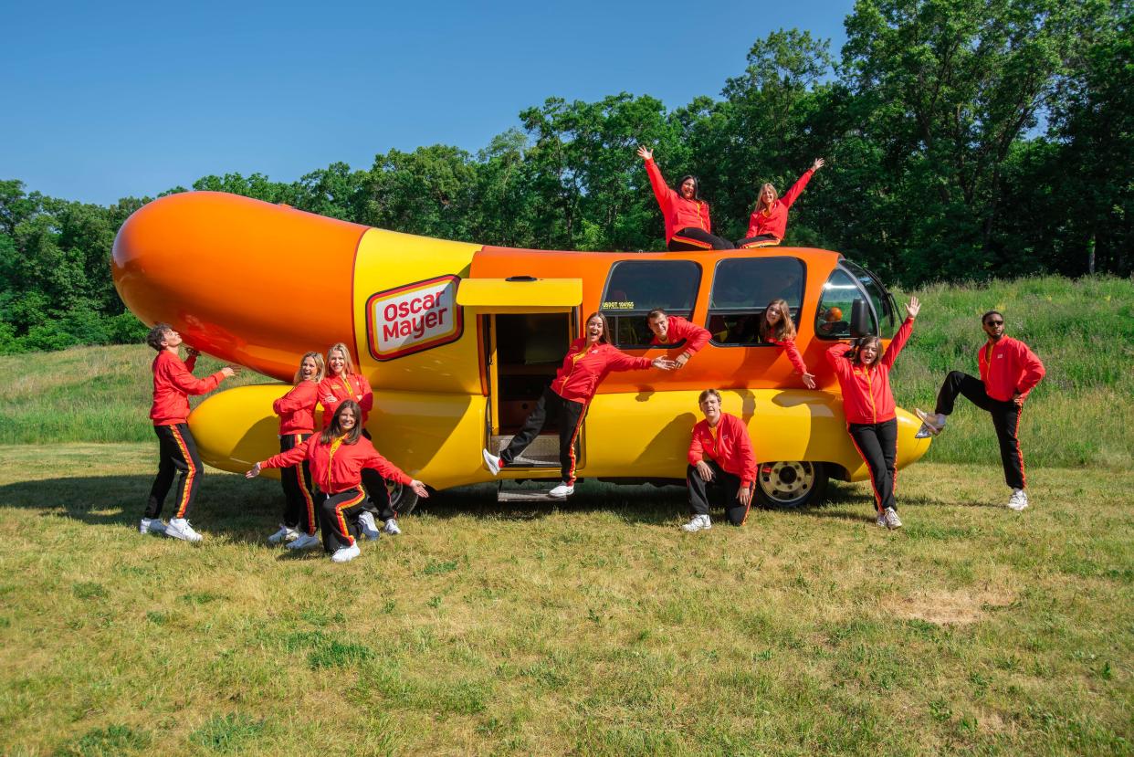 The Oscar Mayer Wienermobile and the Hotdoggers who drive the 27-foot vehicles across the U.S.