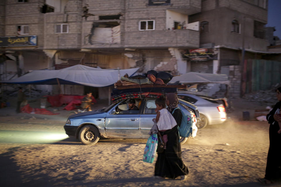 Palestinians displaced by the Israeli air and ground offensive on the Gaza Strip flee from parts of Khan Younis following an evacuation order by the Israeli army to leave the eastern part of Gaza Strip's second largest city on Monday, July 1, 2024. (AP Photo/Jehad Alshrafi)