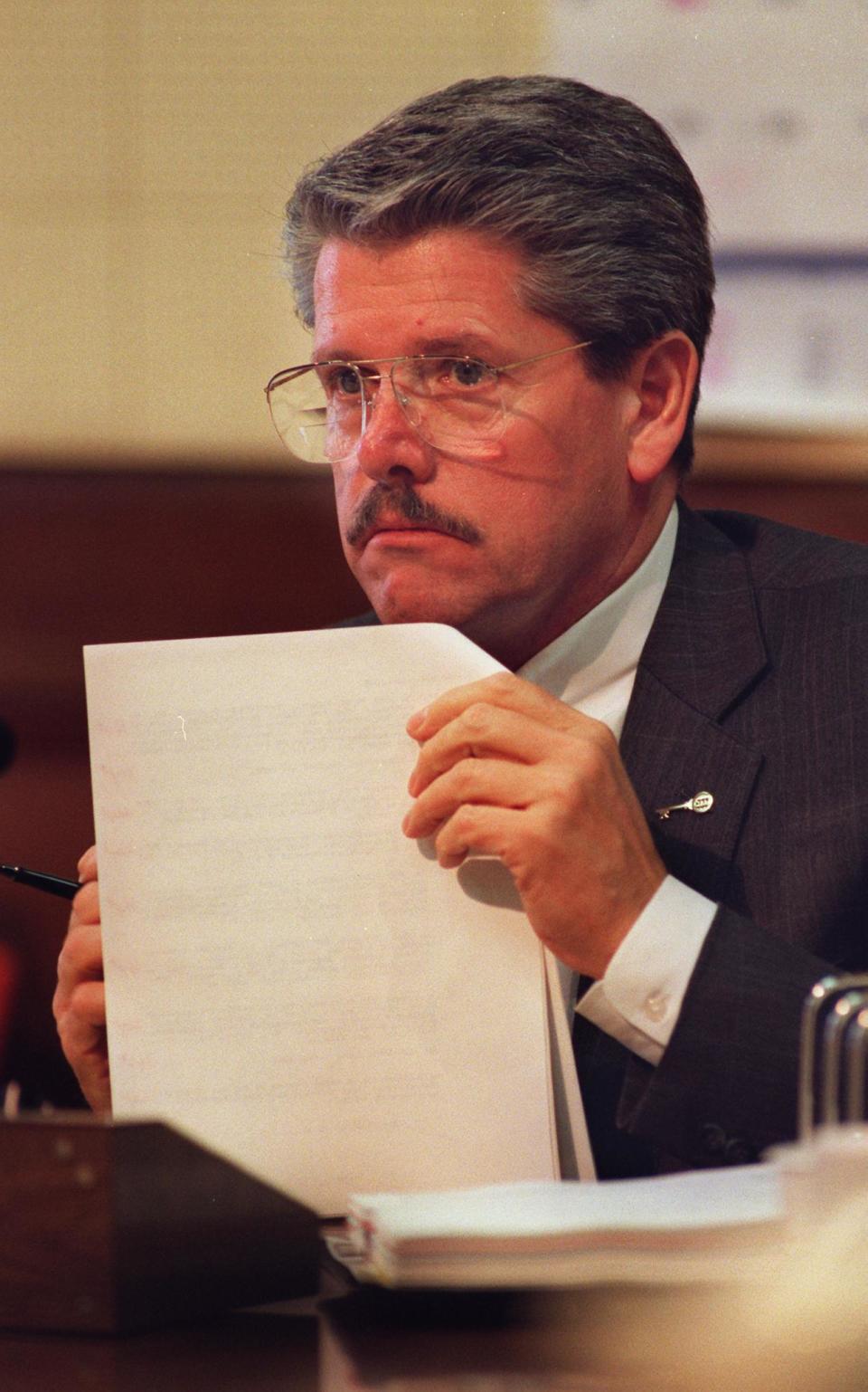 Des Moines Mayor John Pat Dorrian during a Des Moines City Council meeting in 1995. Dorrian, an avid bicyclist who has a city trail named after him, died at 83 years old.