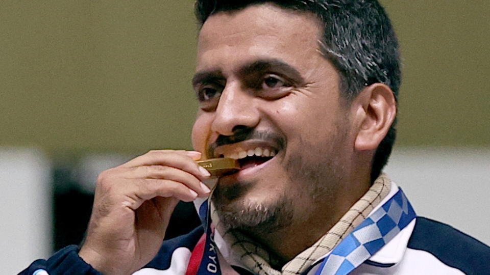 Iran&#39;s Javad Foroughi celebrates his gold medal in air pistol, but not everyone is. (Reuters/Ann Wang)