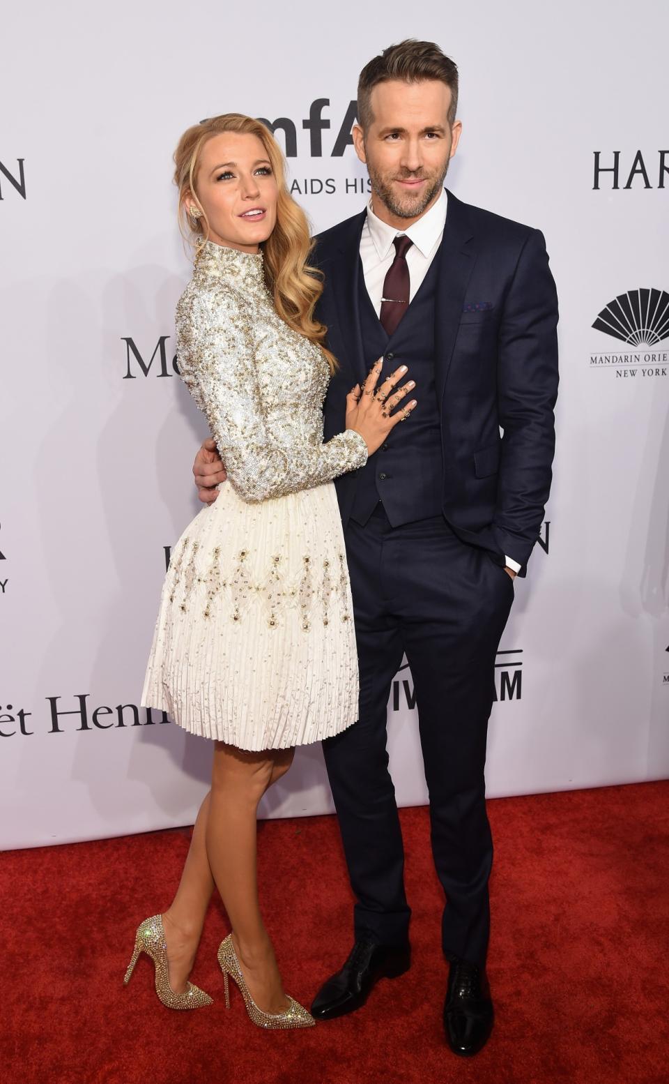 <p>Blake and Ryan are true couple goals with Blake’s feminine style perfectly matching her husband’s tailored suits. <i>[Photo: Getty]</i> </p>