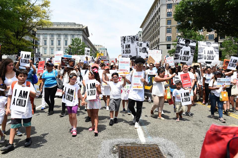 Glamour.com rounded up some of the most powerful signs from the Families Belong Together marches on Saturday.