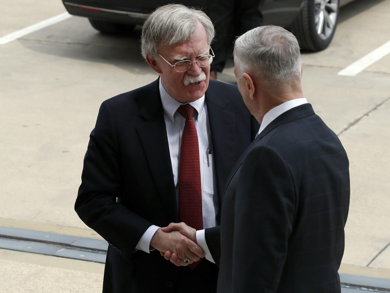 John Bolton shakes hands with Defense Secretary Jim Mattis as Bolton arrives at the Pentagon: AP Photo/Alex Brandon