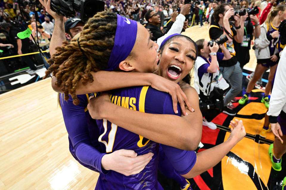 Pictured right to left, LSU stars Angel Reese and LaDazhia Williams celebrate their win over Iowa in the 2023 NCAA Women's Basketball championship decider.