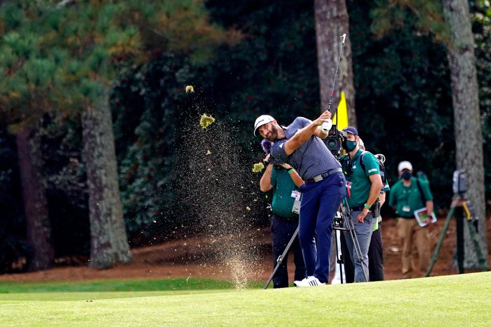 Round 4: Dustin Johnson plays from the fairway on the 18th hole.