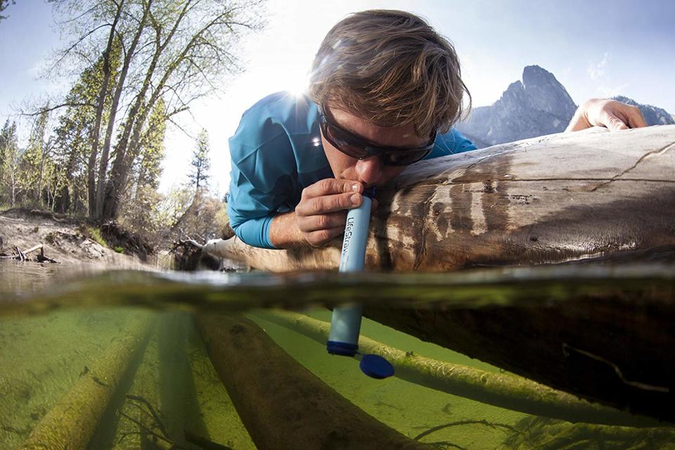The LifeStraw personal water filter is an absolute must for camping and survival gear. Here's why. (Photo: Amazon)