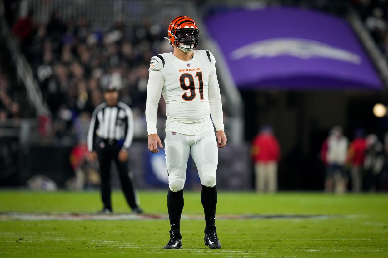 Cincinnati Bengals defensive end Trey Hendrickson (91) paces behind the line in the second quarter of the NFL Week 11 game between the Baltimore Ravens and the Cincinnati Bengals at M&T Bank Stadium in Baltimore on Thursday, Nov. 16, 2023.