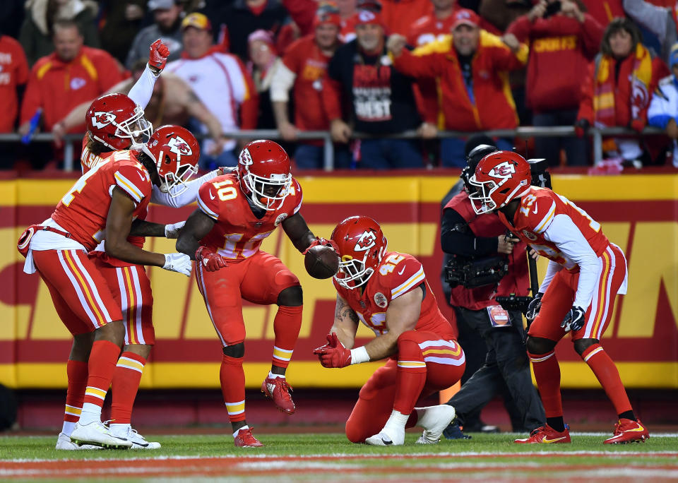 Tyreek Hill got a tire change and some fuel after racing past the Chargers for a touchdown. (Getty)