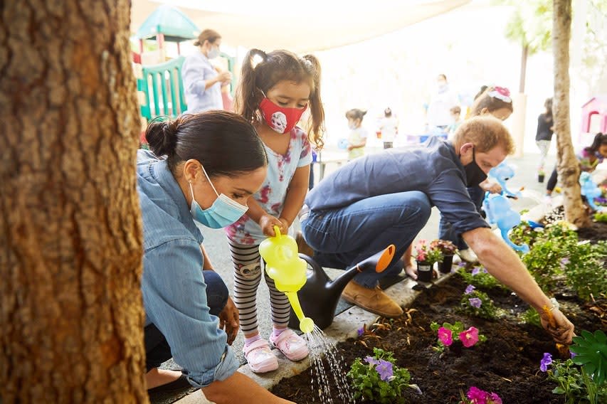 Prince Harry and Meghan Markle plant flowers at Assistance League of LA