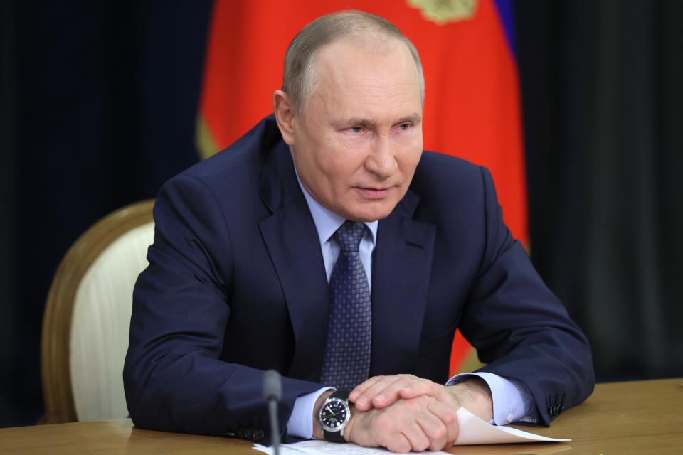 Russian President Vladimir Putin takes part in a ceremony to open ten new stations of the Big Circle Line of the Moscow subway via videoconference at the Bocharov Ruchei residence in the Black Sea resort of Sochi, Russia, Tuesday, Dec. 7, 2021. The Big Circle Line is scheduled to be completed in late 2022. (Mikhail Metzel, Sputnik, Kremlin Pool Photo via AP)