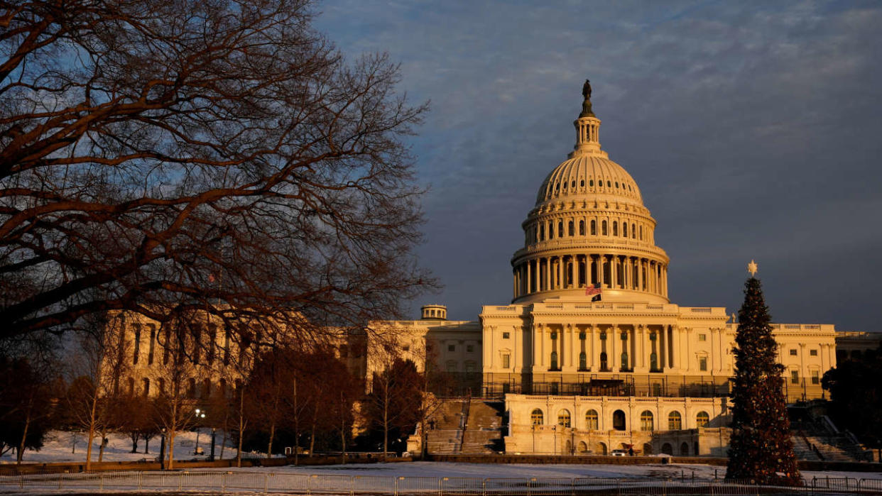 FILE PHOTO: The U.S. Capitol is seen at sunset on the eve of the first anniversary of the January 6, 2021 attack on the building, on Capitol Hill in Washington, U.S., January 5, 2022. REUTERS/Elizabeth Frantz/File Photo