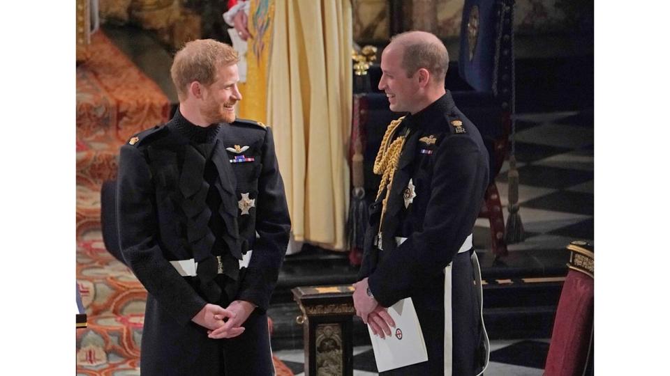 Prince Harry and Prince William laughing at Harry's wedding