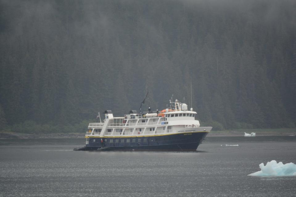 There are plenty of day cruises that travelers can take in June during their visit to Alaska. 
pictured: a boat on the water in Alaska