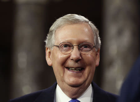 U.S. Senate Majority Leader Mitch McConnell smiles after he ceremonially swore-in, in the Old Senate Chamber on Capitol Hill in Washington January 6, 2015. REUTERS/Larry Downing