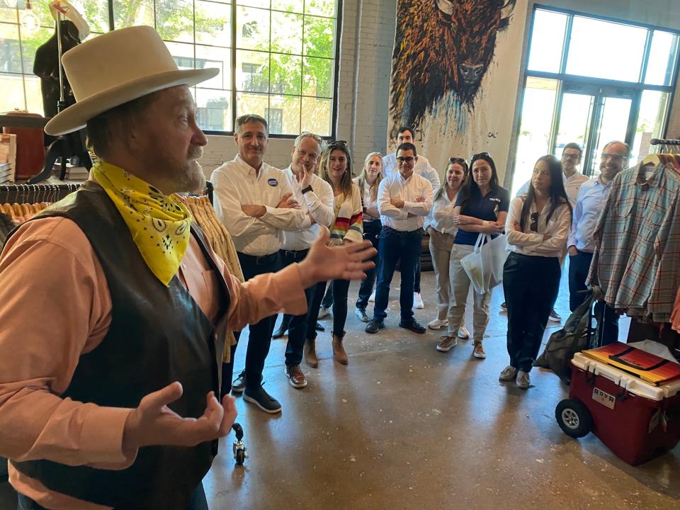 A special guest on the Downtown Abilene Walking Tours joins 'Gus McDusty' to provide entertainment for individuals on the tour.