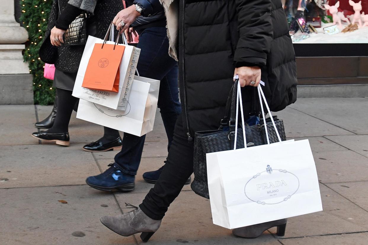 Shoppers: More people are flying in from abroad to make the most of the weaker pound: PA