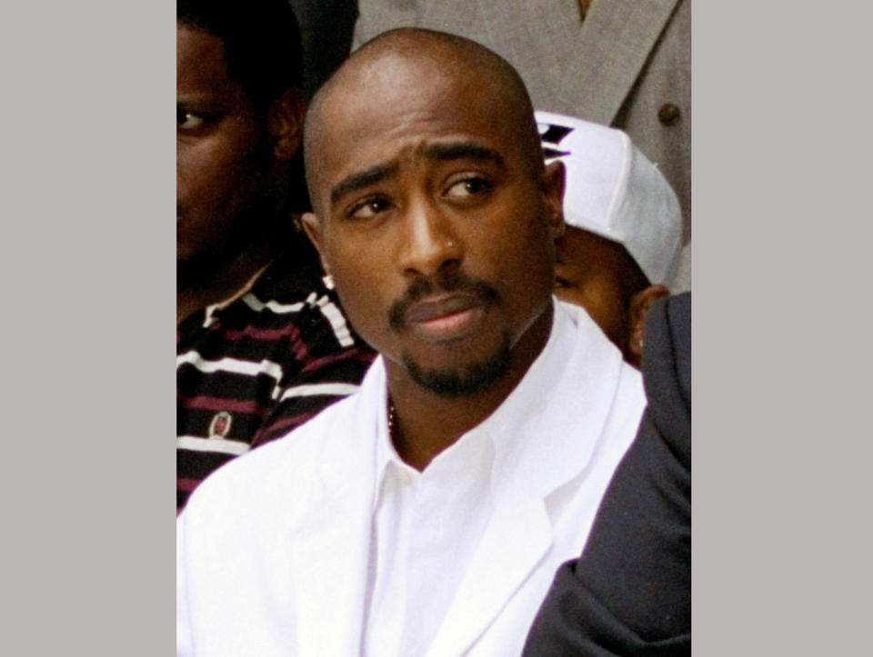 FILE - In this Aug. 15, 1996, file photo, rapper Tupac Shakur attends a voter registration event in South Central Los Angeles. The late rapper and Seattle-based rockers Pearl Jam lead a class of Rock and Roll Hall of Fame inductees that also include folkie Joan Baez and 1970s favorites Journey, Yes and Electric Light Orchestra. The hall's 32nd annual induction ceremony will take place on April 7, 2016, at Barclays Center in Brooklyn, N.Y. (AP Photo/Frank Wiese, File)